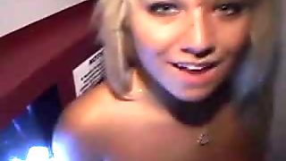 Wild Blonde On Her Knees Working Over Dick At Glory Hole