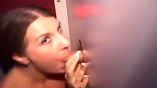 Brunette Sucking Dick And Taking Facial Through A Glory Hole